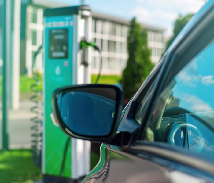 Parked cars near charge station in the city